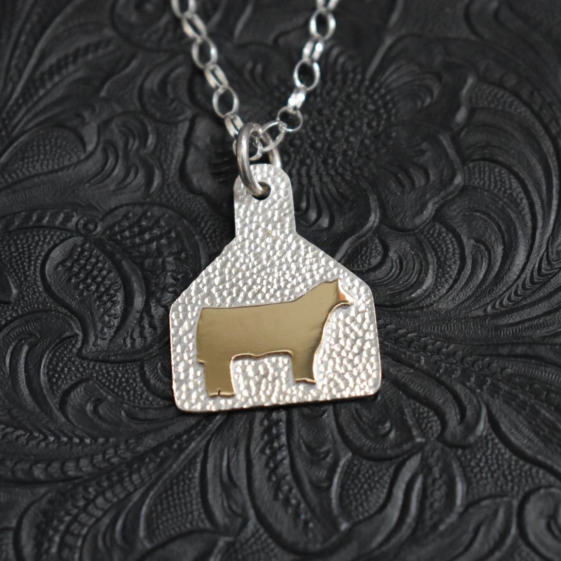 Silver ear tag necklace